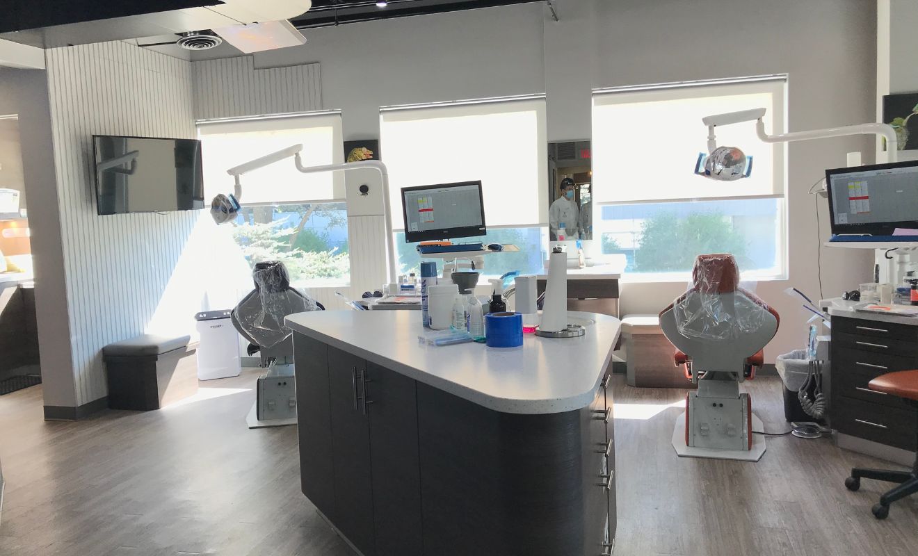 Bright, open orthodontic treatment area with large windows